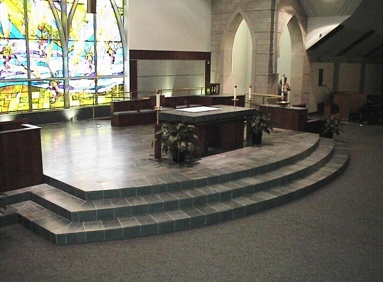 Modern church interior with altar and candles